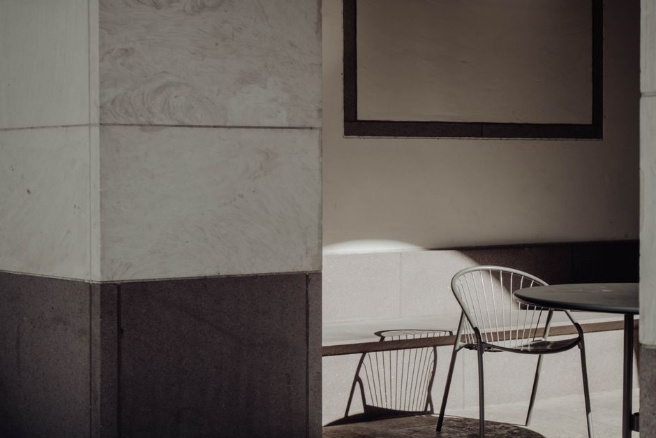 A stylish minimalist seating area showcasing modern architecture and design.